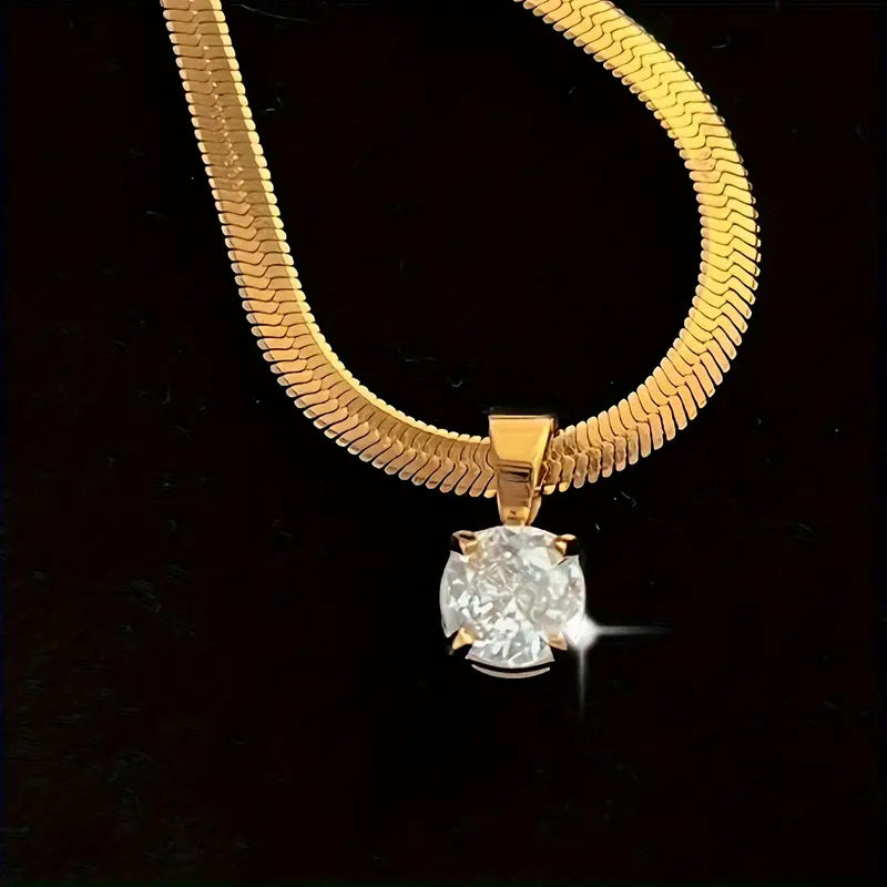 Lucero – Collar con colgante de circonitas en oro