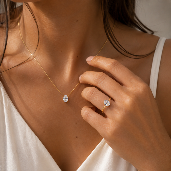 Eden – Oval stone solitaire ring in gold
