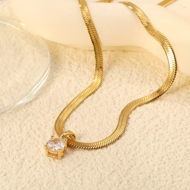 Lucero – Collar con colgante de circonitas en oro
