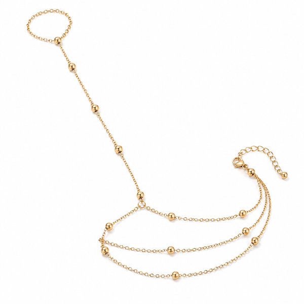 Mykonos – Pulsera hand chain de triple capa en oro