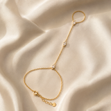 Twinkling – Pulsera hand chain de circonitas marquesa en oro