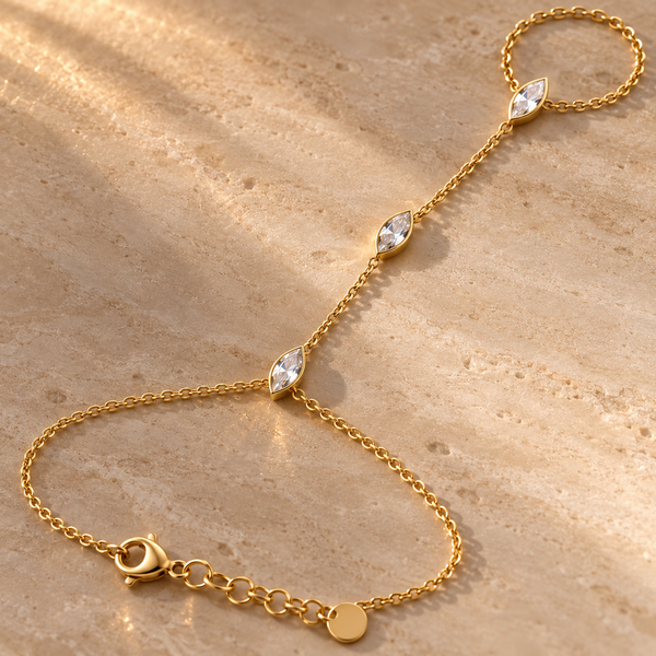 Twinkling – Pulsera hand chain de circonitas marquesa en oro