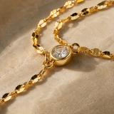 Afterglow – Pulsera hand chain de doble capa con circonita en oro