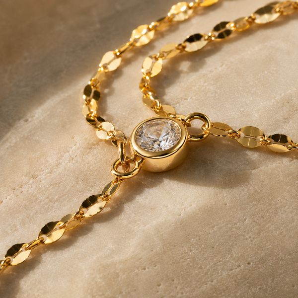 Afterglow – Pulsera hand chain de doble capa con circonita en oro