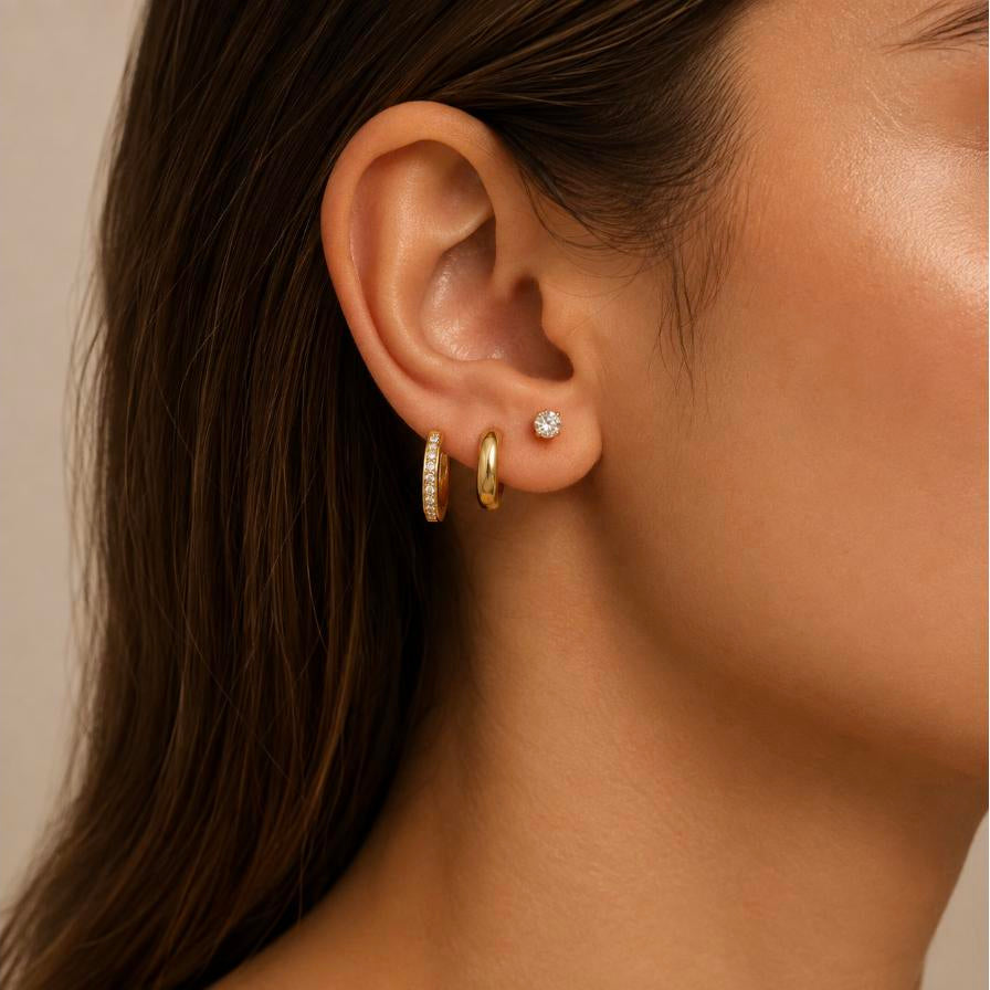 Infinite – Gold pavé cubic zirconia huggie hoops