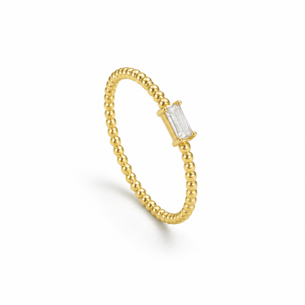 Celestial – Anillo de bolitas con cristal baguette en oro