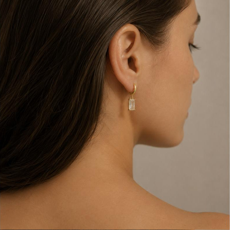 Firmamento – Aros con cristal baguette en oro