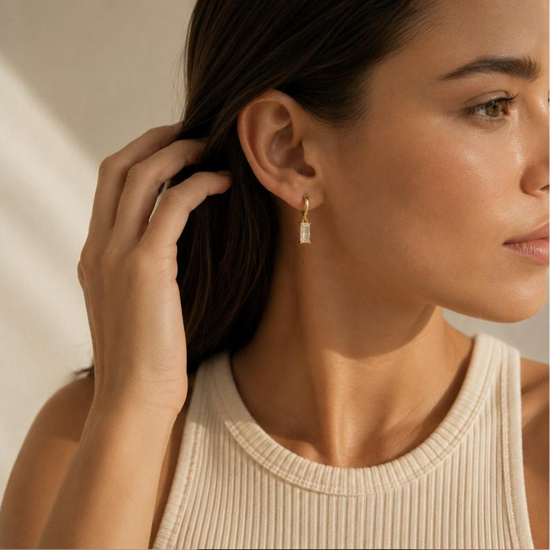 Firmamento – Aros con cristal baguette en oro
