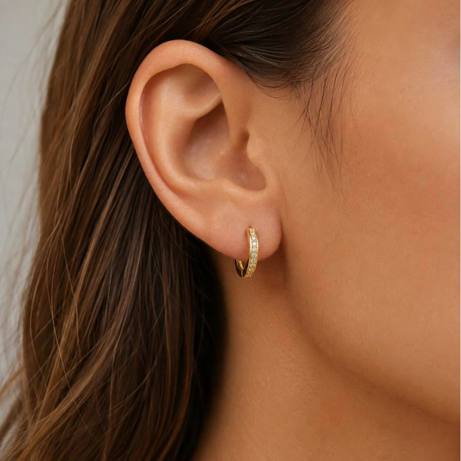 Infinite – Gold pavé cubic zirconia huggie hoops