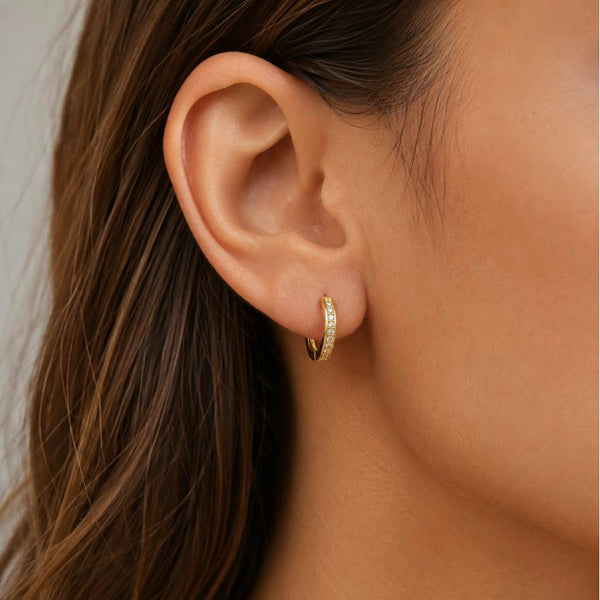 Infinite – Gold pavé cubic zirconia huggie hoops