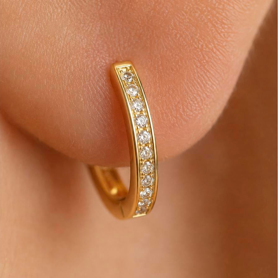 Infinite – Gold pavé cubic zirconia huggie hoops