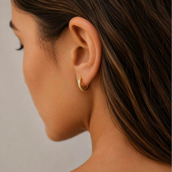 Infinite – Gold pavé cubic zirconia huggie hoops