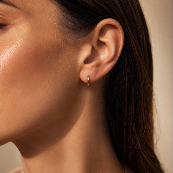 Mustard – Gold mini huggie hoops